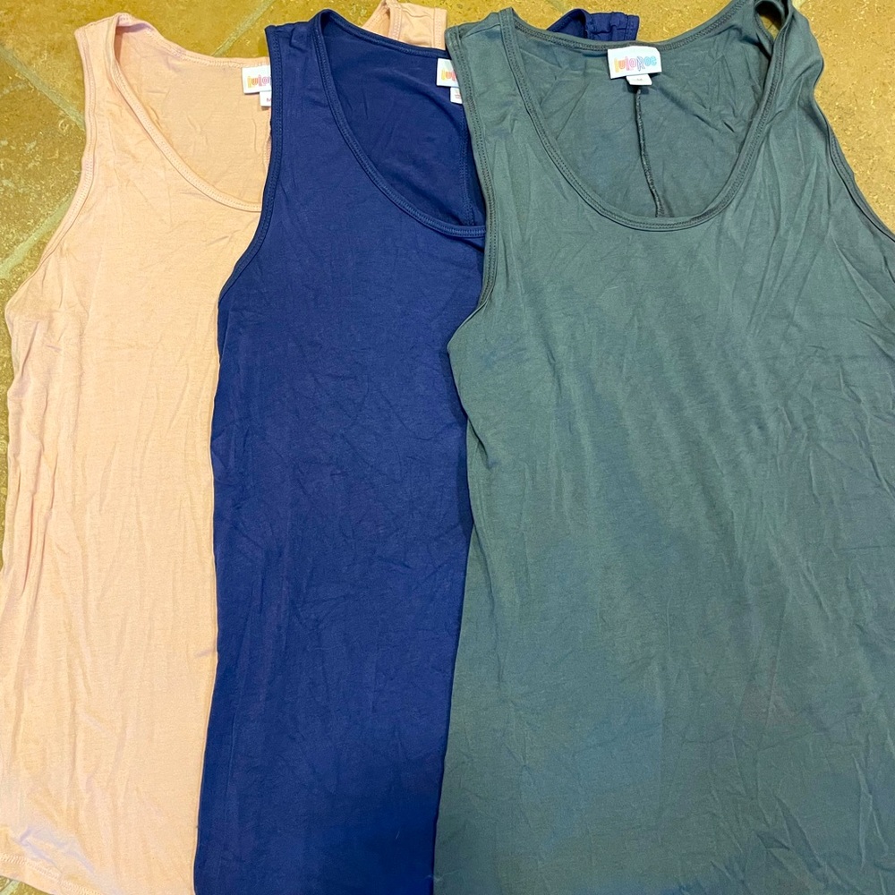 Three LuLaRoe tank tops in great condition, size medium